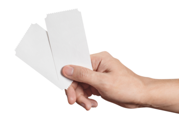 Hand with two tickets, flyers, invitations, coupons, etc., 