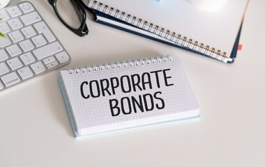CORPORATE BONDS text on green note paper and desk