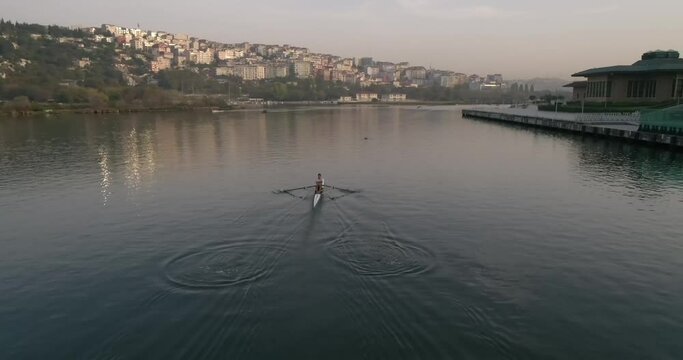 Aerial video of a solo kayak paddling before sunrise on the Golden Horn River