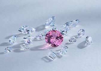 Close up of coloured polished gemstones on light background. High quality photo