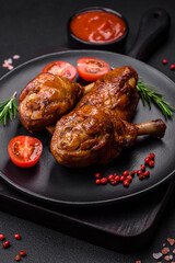 Delicious grilled chicken legs with spices and herbs in teriyaki sauce