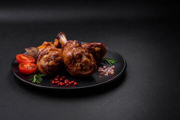Delicious grilled chicken legs with spices and herbs in teriyaki sauce