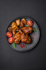Delicious grilled chicken legs with spices and herbs in teriyaki sauce