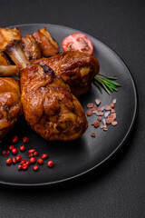 Delicious grilled chicken legs with spices and herbs in teriyaki sauce