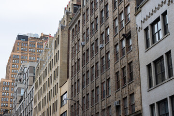 Row of Old Brick Skyscrapers and Buildings in Chelsea of New York City