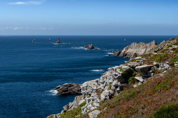 Spectacular Cliffs And Lighthouse At Peninsula Pointe Du Raz At The Finistere Atlantic Coast In Brittany, France