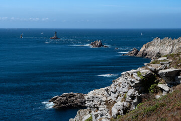 Fototapeta na wymiar Spectacular Cliffs And Lighthouse At Peninsula Pointe Du Raz At The Finistere Atlantic Coast In Brittany, France