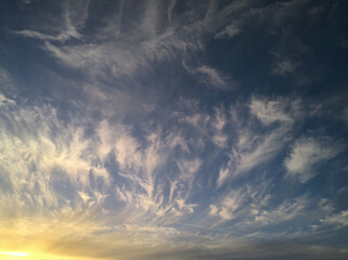 Beautiful heavenly sunset. Strange figures being illuminated by the evening sun