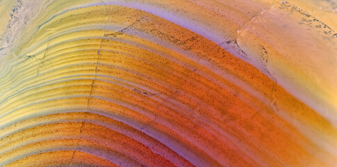 agate lines of orange and yellow structure