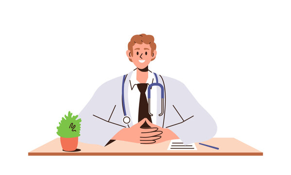 Friendly smiling doctor pediatrician in lab coat looking forward sitting at clinic office table
