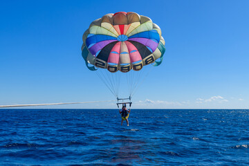 Young woman parasailing at the Red sea, Egypt