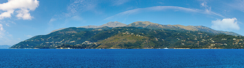 Fototapeta na wymiar Summer view of Corfu island (Greece). Ionian sea coastline landscape. Panorama.