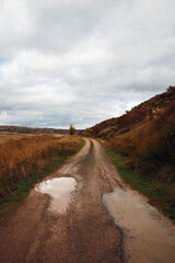 rural road waterlogged by rain