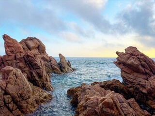 Costa Brava with rocks in the Mediterranean Sea, coastline between Sant Feliu de Guíxols and Tossa de Mar, Canyet de Mar, Girona, Spain