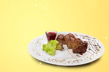 Grilled meat tasty dish in plate