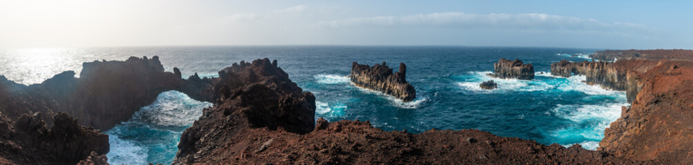 El Hierro Island. Canary Islands, panoramic view at the Arco de la Tosca incredible natural monument of an arch - obrazy, fototapety, plakaty