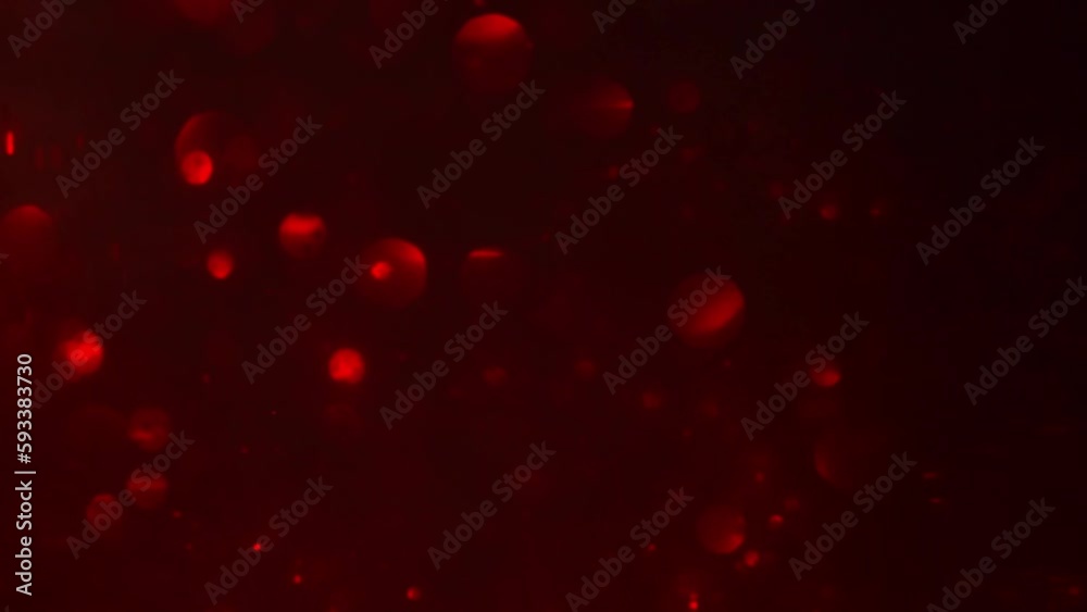 Wall mural red bokeh abstract motion background. defocused red circles abstract movement. shimmering bokeh ligh