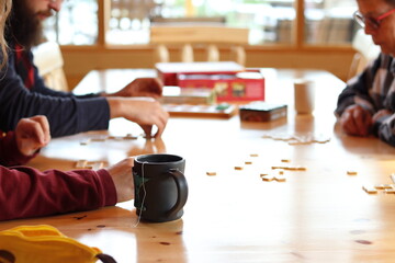 Family board game night at the cabin.