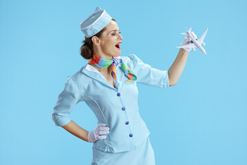 stylish air hostess woman on blue