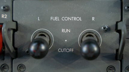 Close up of a fuel control panel in the flight deck of a 787 commercial airplane.
