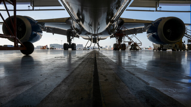 787 Commercial airplane in a hangar for maintenance.