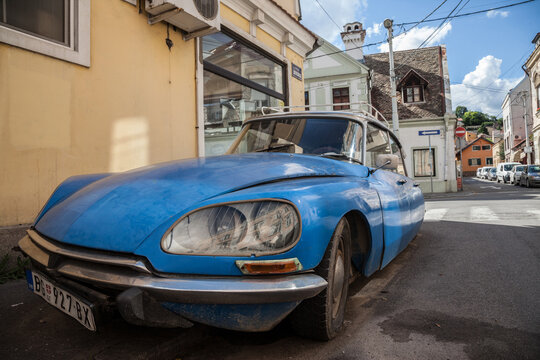 BELGRADE, SERBIA - JUNE 24, 2018: Close up on the light of a blue Citroen DS Original parked in Belgrade. Citroen DS is a luxury car from rance produced in the 1960 and 1970.