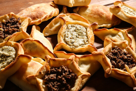 Assorted Mixed Fatayer with Labneh, Zataar, Mortadella, jibin, Mozzarella, Rahash, chocolate, Sabanikh and sujuk baked isolated background top view arabic food