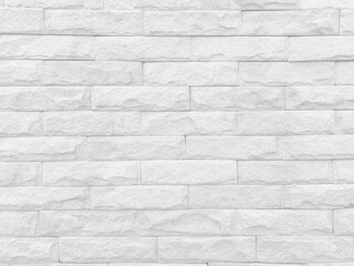 Seamless texture of white stone wall a rough surface, with space for text, for a background..