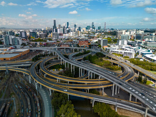 Aerial shot of Brisbane city and highway traffic in Australia in daytime - 593411732