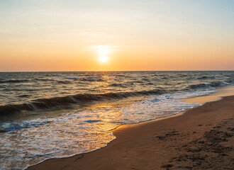 Panorama viewpoint landscape travel summer sea wind wave cool on holiday calm coastal big sun set sky light orange golden Nature tropical Beautiful evening hourday At Bang san Beach Chonburi Thailand.