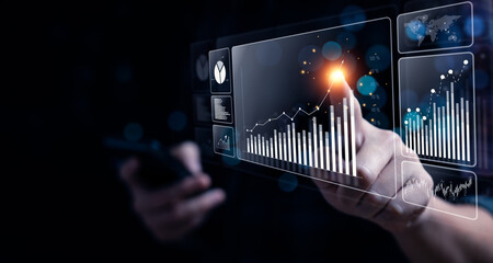 Businessman analyzing business enterprise data management, Business analytics with charts, metrics and KPIs to performance organization. Corporate strategy for finance, operations, sales, marketing