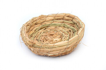 Small basket made of rice straw for bird's nest.Isolated white background.
