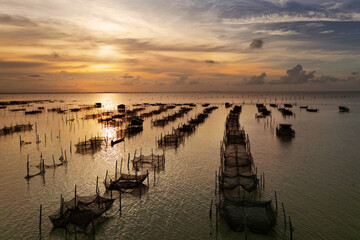 aerial view of traditional fishnet -and fish farm in Phatthalung -Thailand