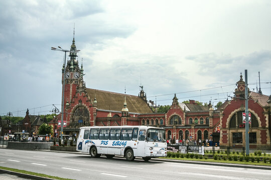 GDANSK, POLAND - JUNE 6, 2009: Gdansk Glowny main train station with a bus belonging to the intercity coach company of Poland PKS. Glowny is a major transportation hub.