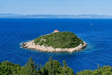 An island in the adriatic sea. Green island in blue adriatic sea , Dalmatia, Croatia. Travel destination, paradise, Travel concept