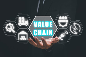 Value chain concept, Businessman hand holding value chain icon on virtual screen.