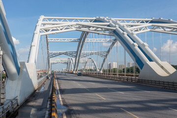 Dong Tru bridge against blue sky in Hanoi, Vietnam