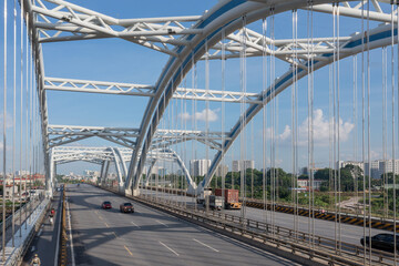 Dong Tru bridge against blue sky in Hanoi, Vietnam