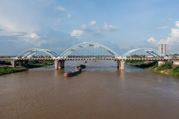 Fototapeta na wymiar Dong Tru bridge against blue sky in Hanoi, Vietnam