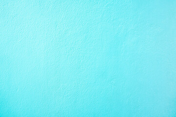 The Rough rendered turquoise wall texture as background.