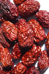 close up Red dates on white background.