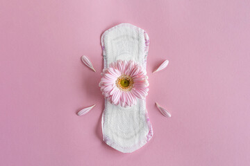 Menstruation period concept. Hygienic white female pad with gerbera flowers. Menstruation, protection. Women's health © Анастасія Стягайло
