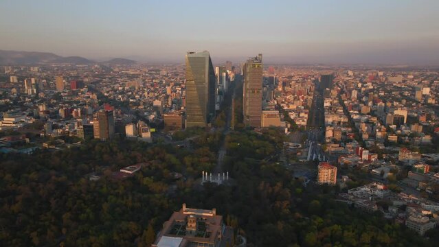 Aerial revealing view Mexico City Castle, Chapultepec forest and cityscape buildings background.Travel sightseeing historical landmarks concept