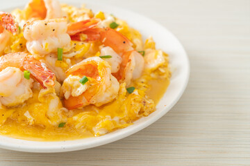 creamy omelet with shrimps or scrambled eggs and shrimps