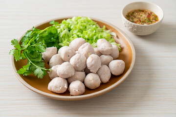 pork meatball with vegetable and spicy sauce