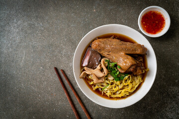 egg noodles with stewed and braised duck in brown soup