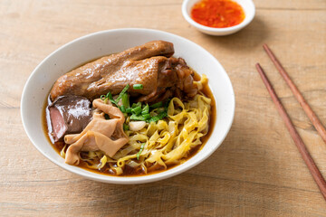 egg noodles with stewed and braised duck in brown soup