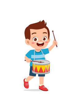 little kid playing one drum and feel happy
