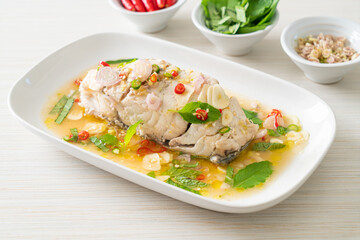 steamed sea bass fish with herbs