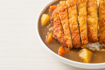 curry rice with fried pork cutlet and creamy omelet